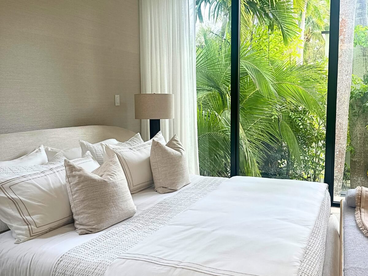 Get Cleaning Services in Coconut Grove | Bright Cleanup Management A professionally made bed by Bright Cleanup after a home cleaning service in Coconut Grove